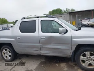 2012 Honda Ridgeline RTL with VIN 5FPYK1F58CB454385, listed as a IAAI auction lot 42212805 with 207,874 mi miles and . Bid and sale history available at DreamBid. Image 6.
