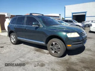 2005 Volkswagen Touareg z VIN WVGBG77L25D010568, wystawiony jako Copart lot #57268755 z przebiegiem 229 928 mil mil oraz Szkoda całkowita • Salvage title. Historia ofert i sprzedaży dostępna na DreamBid. Obrazek 4.