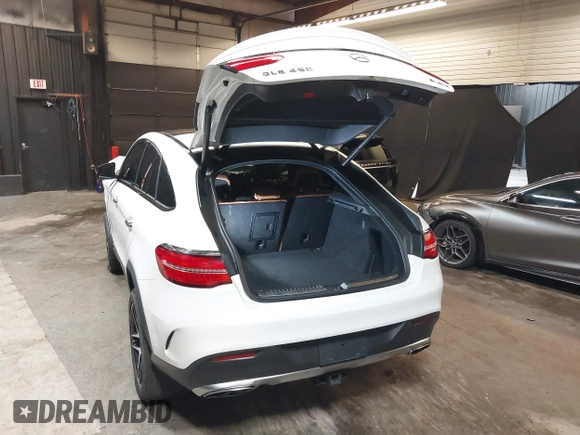 2016 Mercedes-Benz GLE 450 AMG with VIN 4JGED6EB1GA014187, listed as a IAAI auction lot 42341895 with 123,179 mi miles and . Bid and sale history available at DreamBid. Image 3.