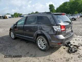 2017 Dodge Journey SXT with VIN 3C4PDCBG2HT533772, listed as a Copart auction lot 54729535 with 160,376 mi miles and Salvage title. Bid and sale history available at DreamBid. Image 2.