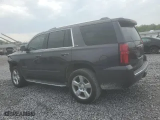2015 Chevrolet Tahoe LTZ with VIN 1GNSCCKC8FR628330, listed as a Copart auction lot 54561835 with 212,503 mi miles and Salvage Title. Bid and sale history available at carsss.com. Image 2.
