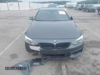 2014 BMW 4 Series 428i with VIN WBA3N7C52EK221929, listed as a IAAI auction lot 42530110 with 126,828 mi miles and . Bid and sale history available at DreamBid. Image 12.