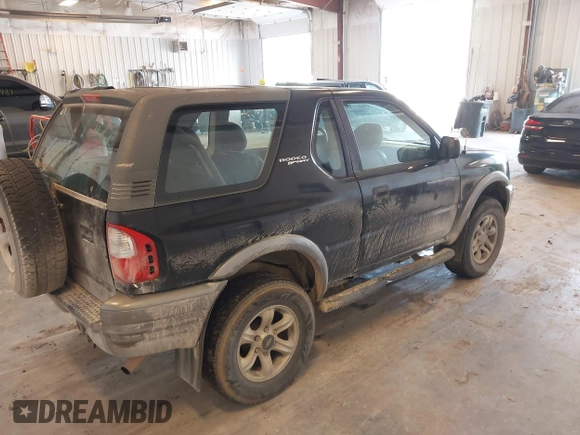 2002 Isuzu Rodeo with VIN 4S2CM57W124335034, listed as a IAAI auction lot 42446556 with 214,718 mi miles and . Bid and sale history available at DreamBid. Image 4.