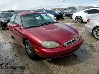 1999 Mercury Sable GS with VIN 1MEFM50U8XA606034, listed as a Copart auction lot 49061995 with 245,641 mi miles and Salvage Title. Bid and sale history available at DreamBid. Image 11.