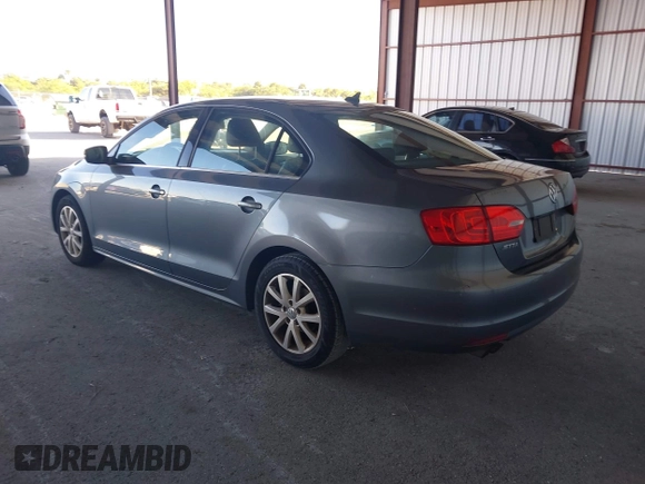 2013 Volkswagen Jetta SE z VIN 3VWDX7AJ3DM254962, wystawiony jako IAAI lot #41753707 z przebiegiem 125 225 mil mil oraz . Historia ofert i sprzedaży dostępna na DreamBid. Obrazek 3.