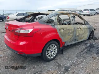 2012 Ford Focus SE with VIN 1FAHP3F20CL333459, listed as a IAAI auction lot 41866827 with Not provided miles and . Bid and sale history available at DreamBid. Image 4.