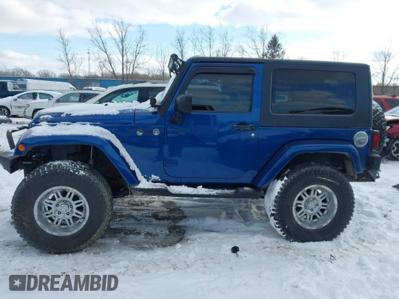 2010 Jeep Wrangler Sahara z VIN 1J4AA5D18AL170957, wystawiony jako IAAI lot #41599820 z przebiegiem 64 217 mil mil oraz . Historia ofert i sprzedaży dostępna na DreamBid. Obrazek 14.