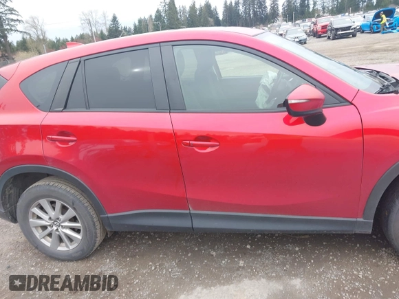 2016 Mazda CX-5 Touring with VIN JM3KE4CY2G0894930, listed as a IAAI auction lot 41906809 with 123,125 mi miles. Bid and sale history available at carsss.com. Image 13.
