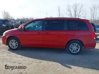 2014 Dodge Grand Caravan SXT with VIN 2C4RDGCG8ER245316, listed as a IAAI auction lot 41871425 with 150,361 mi miles and . Bid and sale history available at DreamBid. Image 14.