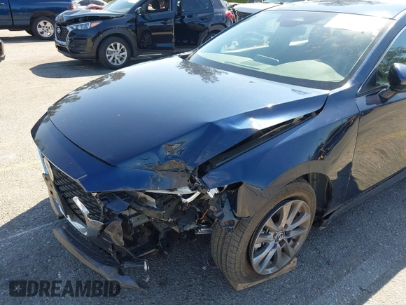 2024 Mazda 3 S with VIN 3MZBPAAMXRM421243, listed as a IAAI auction lot 41997588 with 10,099 mi miles and . Bid and sale history available at DreamBid. Image 6.