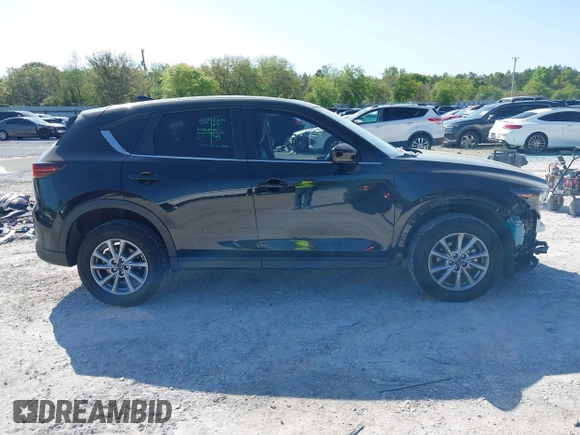 2023 Mazda CX-5 S Preferred with VIN JM3KFBCM7P0188244, listed as a IAAI auction lot 41969630 with 51,058 mi miles and . Bid and sale history available at carsss.com. Image 14.
