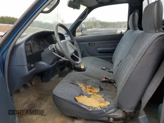 1994 Toyota Pickup DX z VIN 4TARN01P5RZ232120, wystawiony jako Copart lot #44245255 z przebiegiem 123 342 mil mil oraz Czysty tytuł • Clean title. Historia ofert i sprzedaży dostępna na DreamBid. Obrazek 7.
