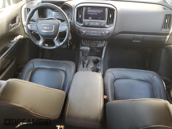 2021 GMC Canyon 4WD AT4 w/Cloth with VIN 1GTG6FEN1M1295551, listed as a Copart auction lot 74900294 with 39,853 mi miles and Salvage Title. Bid and sale history available at carsss.com. Image 8.