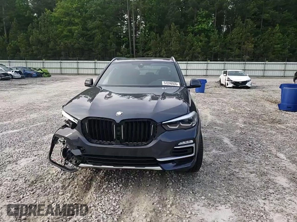 2019 BMW X5 xDrive40i with VIN 5UXCR6C53KLK82812, listed as a Copart auction lot 57246935 with Not provided miles and Salvage title. Bid and sale history available at DreamBid. Image 14.