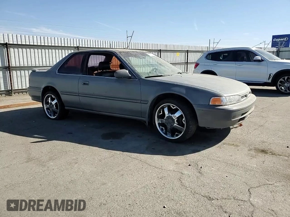 1992 Honda Accord z VIN 1HGCB7254NA015113, wystawiony jako Copart lot #77223284 z przebiegiem 219 007 mil mil oraz Szkoda całkowita • Salvage title. Historia ofert i sprzedaży dostępna na DreamBid. Obrazek 10.