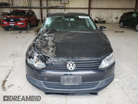 2013 Volkswagen Jetta SE with VIN 3VWDX7AJXDM427263, listed as a Copart auction lot 52502585 with 243,457 mi miles and Salvage title. Bid and sale history available at DreamBid. Image 5.