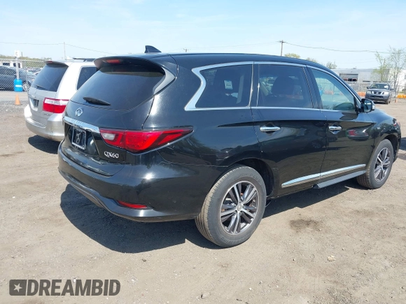 2018 Infiniti QX60 with VIN 5N1DL0MM4JC529193, listed as a IAAI auction lot 42091013 with 202,602 mi miles. Bid and sale history available at carsss.com. Image 4.