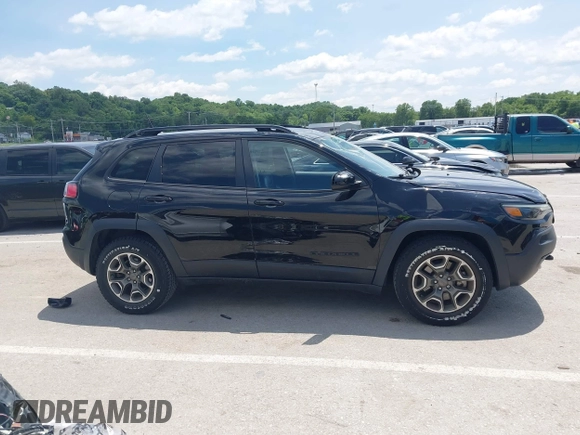 2020 Jeep Cherokee Latitude z VIN 1C4PJMCX3LD584466, wystawiony jako IAAI lot #42380627 z przebiegiem 53 062 mil mil oraz . Historia ofert i sprzedaży dostępna na DreamBid. Obrazek 13.