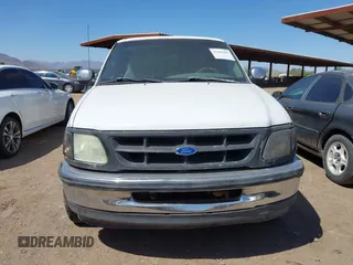 1997 Ford F-150 with VIN 1FTDX1764VKB98042, listed as a IAAI auction lot 42442450 with 203,620 mi miles and . Bid and sale history available at DreamBid. Image 6.