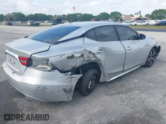 2016 Nissan Maxima SL with VIN 1N4AA6AP0GC433932, listed as a IAAI auction lot 41897180 with 91,871 mi miles and . Bid and sale history available at DreamBid. Image 4.