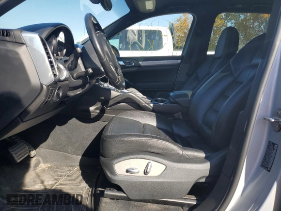 2012 Porsche Cayenne S Hybrid with VIN WP1AE2A25CLA90720, listed as a Copart auction lot 76467154 with 100,460 mi miles and Clean title. Bid and sale history available at DreamBid. Image 7.