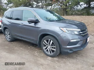 2017 Honda Pilot Touring with VIN 5FNYF6H92HB012090, listed as a IAAI auction lot 41882542 with 110,179 mi miles and . Bid and sale history available at DreamBid. Image 1.