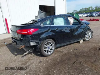 2016 Ford Focus Titanium with VIN 1FADP3J22GL242818, listed as a IAAI auction lot 42177015 with Not provided miles and . Bid and sale history available at DreamBid. Image 4.
