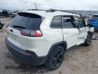 2019 Jeep Cherokee Latitude Plus with VIN 1C4PJLLBXKD405322, listed as a IAAI auction lot 41708104 with 93,295 mi miles and . Bid and sale history available at DreamBid. Image 4.