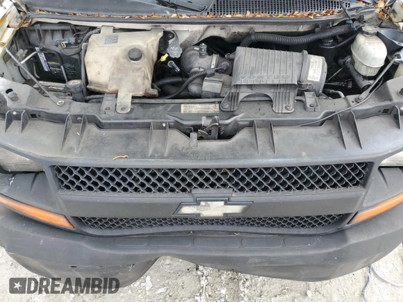 2004 Chevrolet Express Cargo with VIN 1GCGG25U841188896, listed as a Copart auction lot 59914195 with 331,537 mi miles and Salvage title. Bid and sale history available at DreamBid. Image 12.