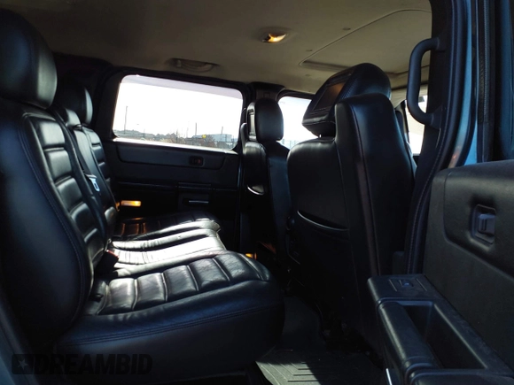2005 Hummer H2 SUV with VIN 5GRGN23U15H117796, listed as a IAAI auction lot 41543913 with 195,560 mi miles. Bid and sale history available at carsss.com. Image 8.