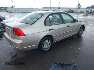 2001 Honda Civic LX with VIN JHMES16551S008933, listed as a IAAI auction lot 41912653 with 142,277 mi miles and . Bid and sale history available at DreamBid. Image 4.