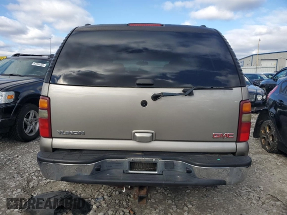 2003 GMC Yukon SLT with VIN 1GKEC13V93J286203, listed as a Copart auction lot 81538984 with 258,338 mi miles and Salvage Title. Bid and sale history available at carsss.com. Image 6.