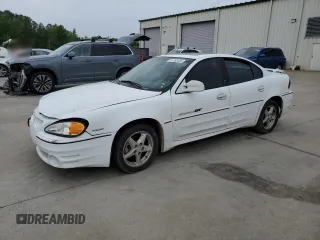 2000 Pontiac Grand Am GT z VIN 1G2NW52E2YM799735, wystawiony jako Copart lot #51782455 z przebiegiem 181 850 mil mil oraz Szkoda całkowita • Salvage title. Historia ofert i sprzedaży dostępna na DreamBid. Obrazek 1.