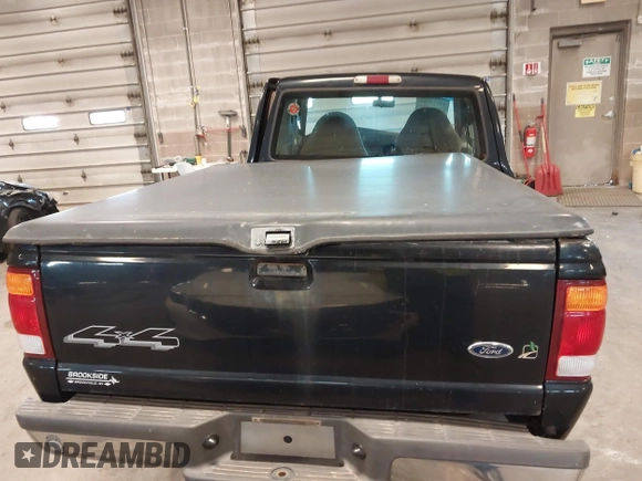 1999 Ford Ranger XL with VIN 1FTZR15V4XPB56809, listed as a IAAI auction lot 41874991 with 165,487 mi miles. Bid and sale history available at carsss.com. Image 16.