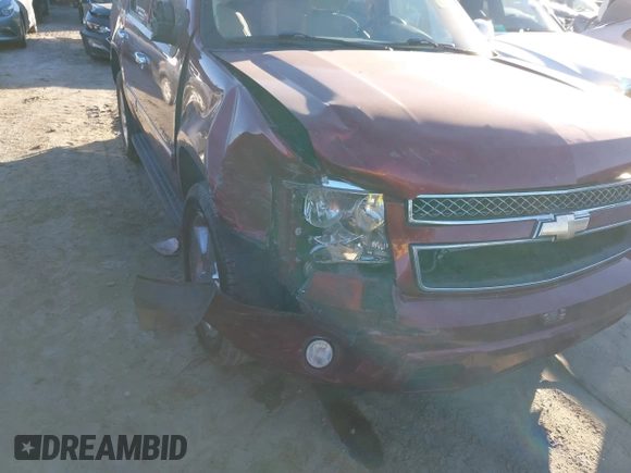 2010 Chevrolet Tahoe LTZ z VIN 1GNUCCE03AR183627, wystawiony jako IAAI lot #40912231 z przebiegiem 234 841 mil mil oraz . Historia ofert i sprzedaży dostępna na DreamBid. Obrazek 6.