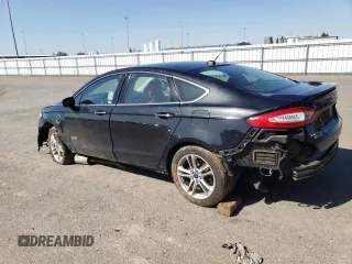 2015 Ford Fusion Energi Titanium with VIN 3FA6P0SU9FR147017, listed as a Copart auction lot 51545365 with 147,241 mi miles and Salvage Title. Bid and sale history available at carsss.com. Image 2.