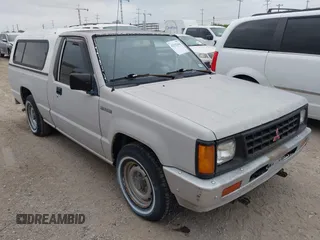 1990 Mitsubishi Mighty Max with VIN JA7FL24W6LP031144, listed as a IAAI auction lot 42152666 with 212,104 mi miles and . Bid and sale history available at DreamBid. Image 1.