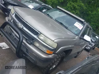 2003 Chevrolet Tahoe LT with VIN 1GNEC13Z73R247245, listed as a IAAI auction lot 42001442 with 263,939 mi miles. Bid and sale history available at carsss.com. Image 2.