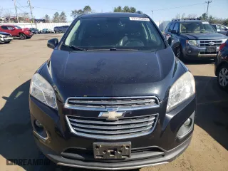 2015 Chevrolet Trax LTZ with VIN 3GNCJTSB8FL219933, listed as a Copart auction lot 53712585 with 128,325 mi miles and Clean Title. Bid and sale history available at carsss.com. Image 5.