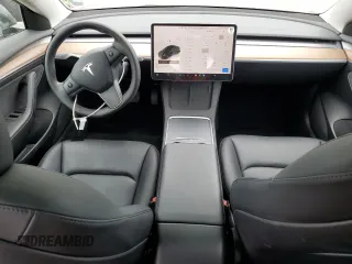 2023 Tesla Model 3 z VIN 5YJ3E1EA7PF600239, wystawiony jako Copart lot #56557705 z przebiegiem 18 851 mil mil oraz Szkoda całkowita • Salvage title. Historia ofert i sprzedaży dostępna na DreamBid. Obrazek 8.