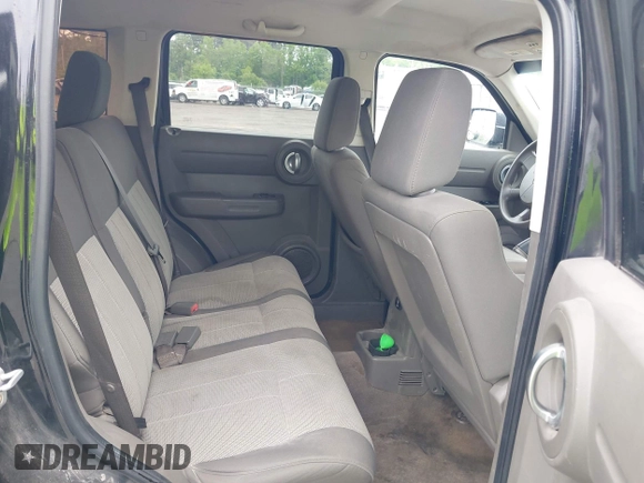 2007 Dodge Nitro SXT with VIN 1D8GT28K17W605984, listed as a IAAI auction lot 41970841 with 118,700 mi miles. Bid and sale history available at carsss.com. Image 8.