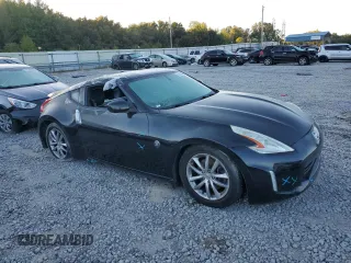 2013 Nissan 370Z with VIN JN1AZ4EH6DM381807, listed as a Copart auction lot 79241394 with Not Provided miles and Salvage Title. Bid and sale history available at carsss.com. Image 4.