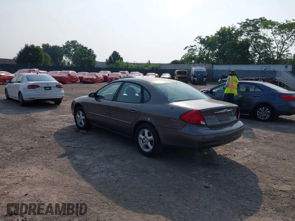 2003 Ford Taurus SE Standard with VIN 1FAFP53203G173180, listed as a IAAI auction lot 42495369 with 129,091 mi miles and . Bid and sale history available at DreamBid. Image 3.