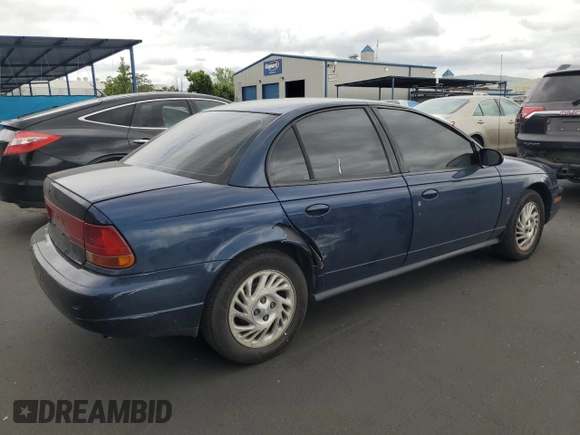1998 Saturn SL z VIN 1G8ZK5277WZ174641, wystawiony jako Copart lot #54620995 z przebiegiem 109 742 mil mil oraz Szkody całkowita. Historia ofert i sprzedaży dostępna na DreamBid. Obrazek 3.