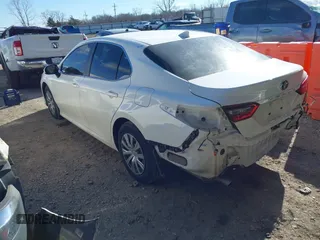 2022 Toyota Camry Hybrid LE with VIN 4T1C31AK7NU588937, listed as a IAAI auction lot 41401438 with 50,361 mi miles and . Bid and sale history available at carsss.com. Image 3.