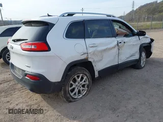 2016 Jeep Cherokee Latitude with VIN 1C4PJMCS1GW242545, listed as a IAAI auction lot 42048421 with 84,667 mi miles and . Bid and sale history available at carsss.com. Image 4.
