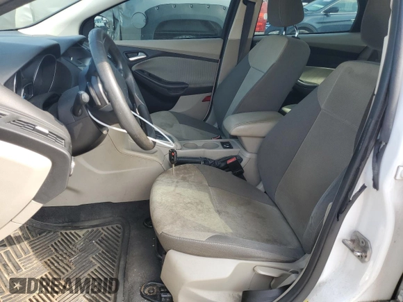 2012 Ford Focus SE z VIN 1FAHP3F2XCL310660, wystawiony jako Copart lot #60217625 z przebiegiem 208 807 mil mil oraz Szkoda całkowita • Salvage title. Historia ofert i sprzedaży dostępna na DreamBid. Obrazek 7.