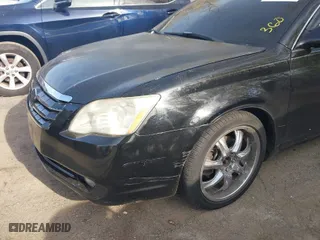 2006 Toyota Avalon XL with VIN 4T1BK36B26U118836, listed as a IAAI auction lot 42062196 with 187,221 mi miles. Bid and sale history available at carsss.com. Image 6.