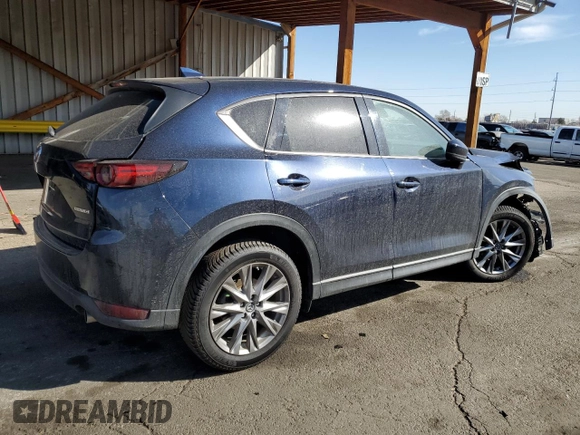 2020 Mazda CX-5 Grand Touring with VIN JM3KFBDM3L0786159, listed as a Copart auction lot 48535635 with 87,540 mi miles and Salvage Title. Bid and sale history available at carsss.com. Image 3.