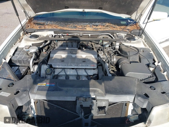 1999 Cadillac DeVille z VIN 1G6KD54Y7XU720668, wystawiony jako IAAI lot #42147461 z przebiegiem 92 054 mil mil oraz . Historia ofert i sprzedaży dostępna na DreamBid. Obrazek 10.